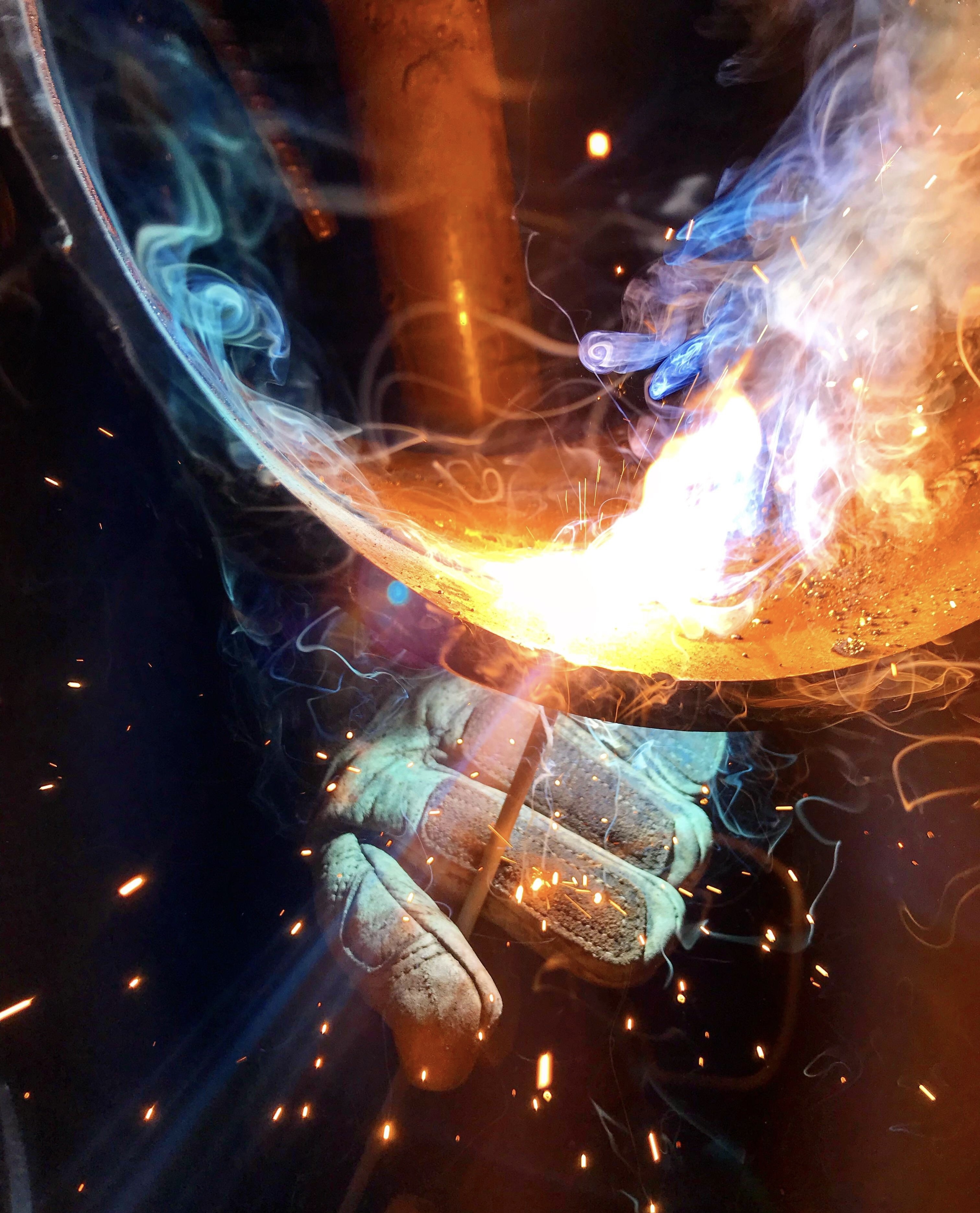 person welding